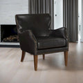 Dark brown high-legged armchair with wing back