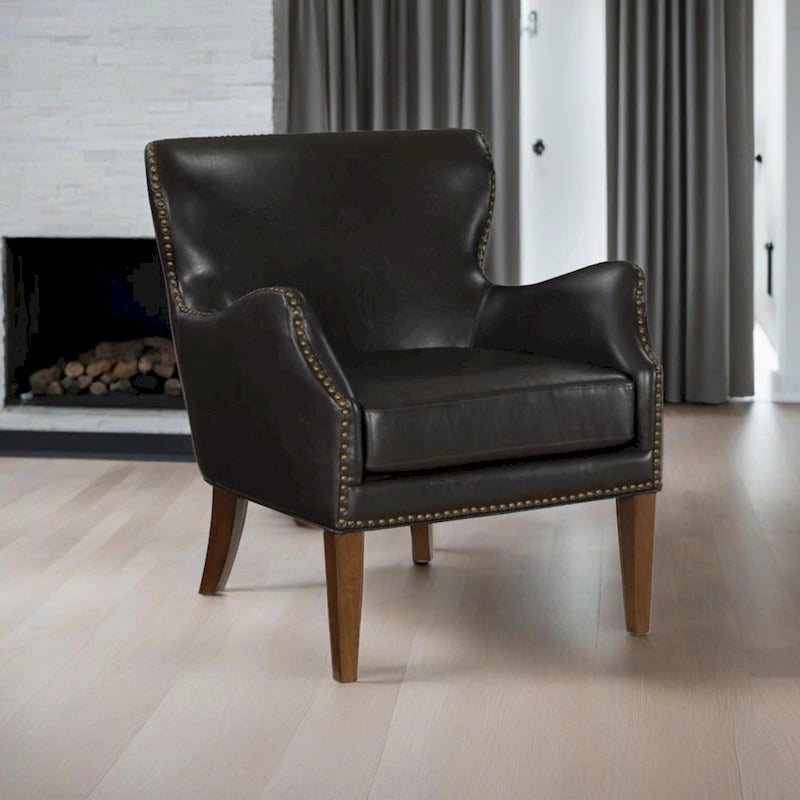 Dark brown high-legged armchair with wing back